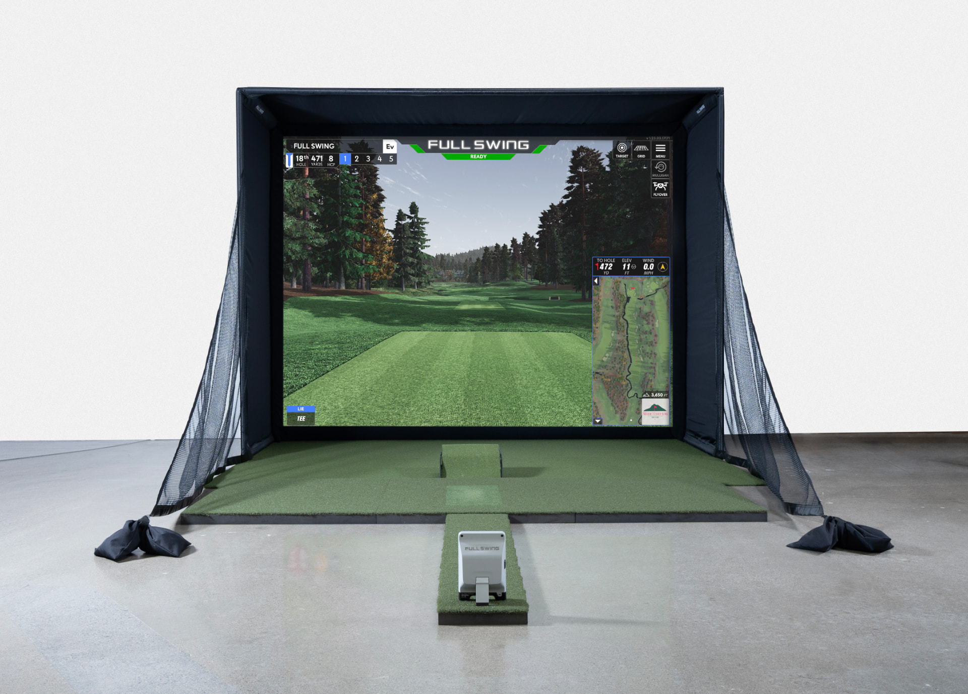 Full Swing KIT Studio viewed head-on with side barrier netting and ground projector box